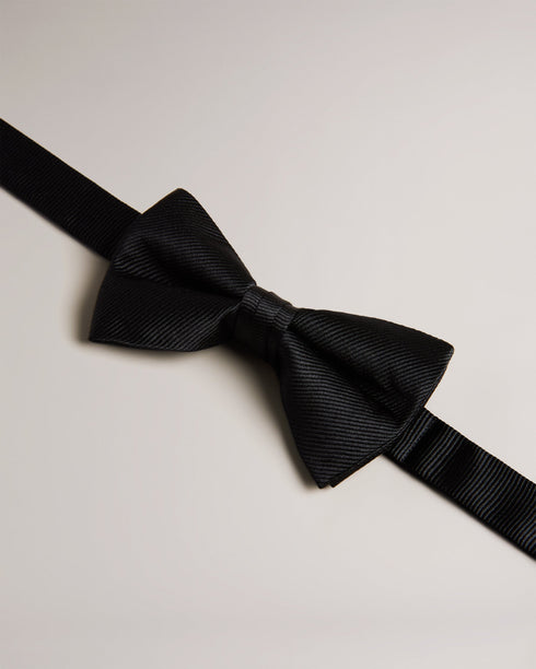 BROSNEY-Ties-The BROSNEY bow tie is the perfect way to add some panache to your look. Made from pure silk, this tie features a ribbed texture for an extra dapper feel. It comes ready-tied for minimal fussing, and has an adjustable neck band for your perfect fit. Bow tie 100% silk Ottoman ribbed texture Pre-tied Adjustable length- Ted Baker Romania